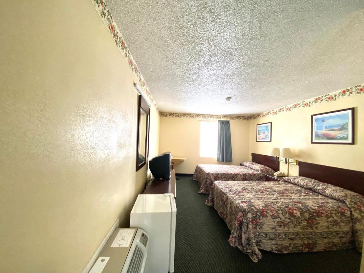 Economy Inn Суийтуотър Екстериор снимка