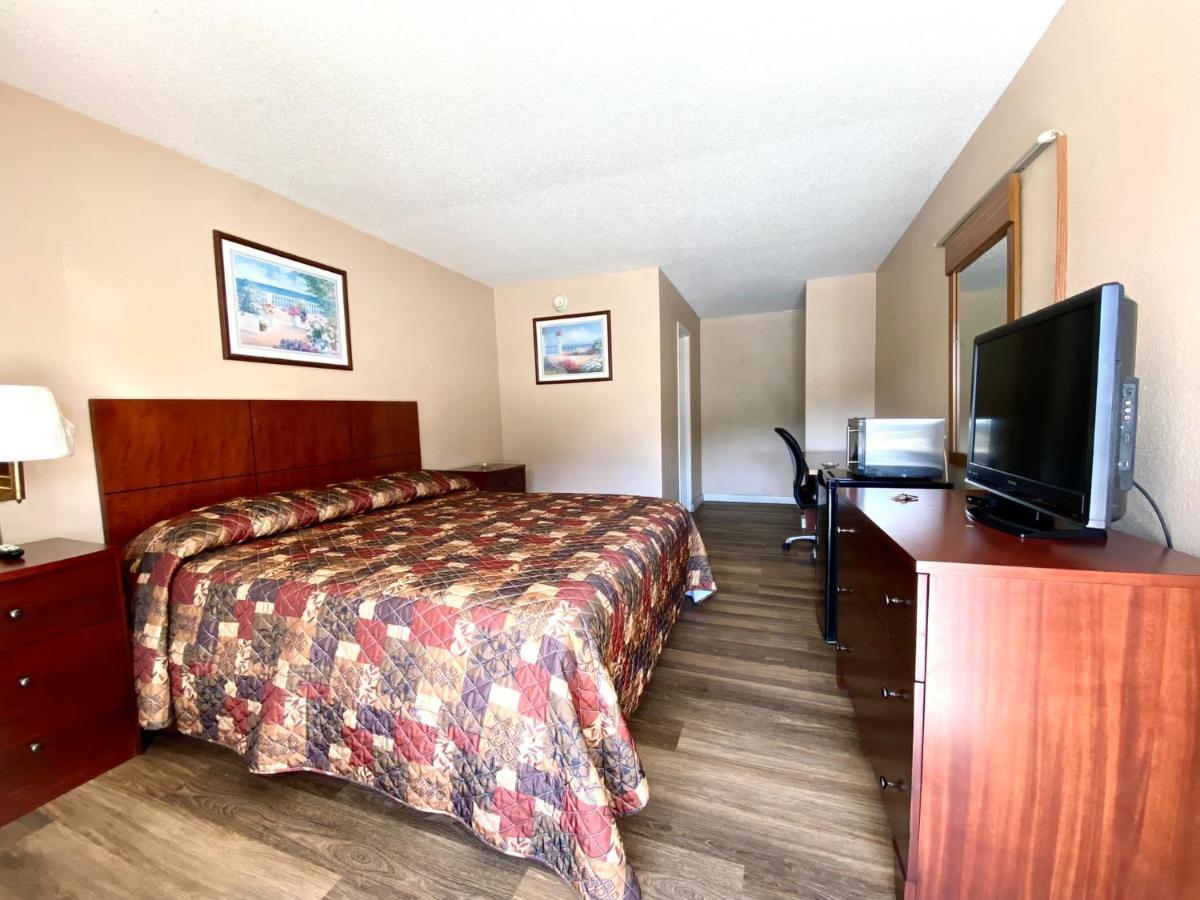 Economy Inn Суийтуотър Екстериор снимка