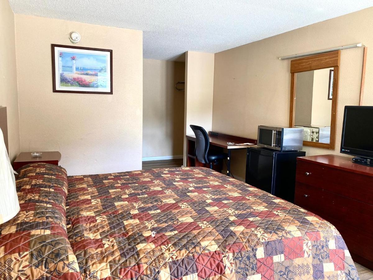 Economy Inn Суийтуотър Екстериор снимка