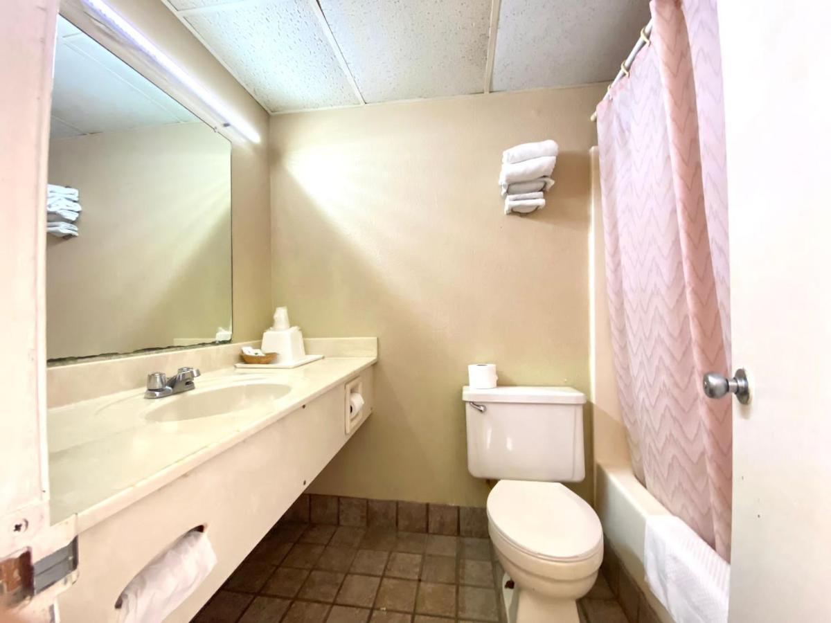 Economy Inn Суийтуотър Екстериор снимка